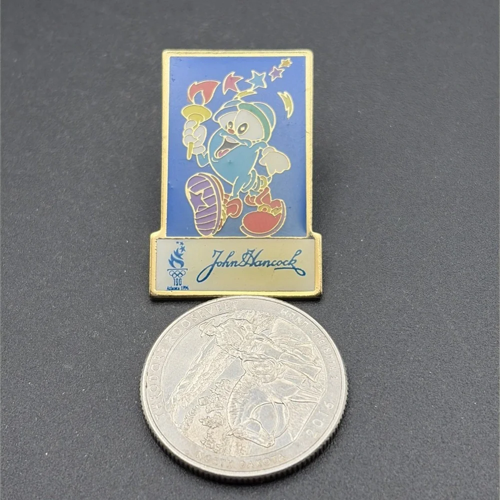 1996 Atlanta Olympics Izzy Mascot John Hancock Sponsor Lapel Hat Pin‎